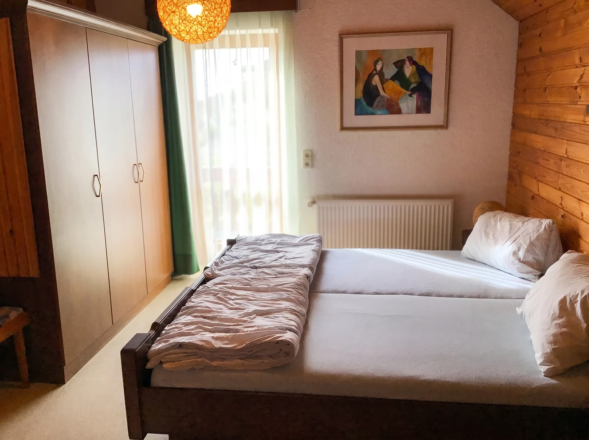 Zweites Schlafzimmer mit Doppelbett in Ferienwohnung 2